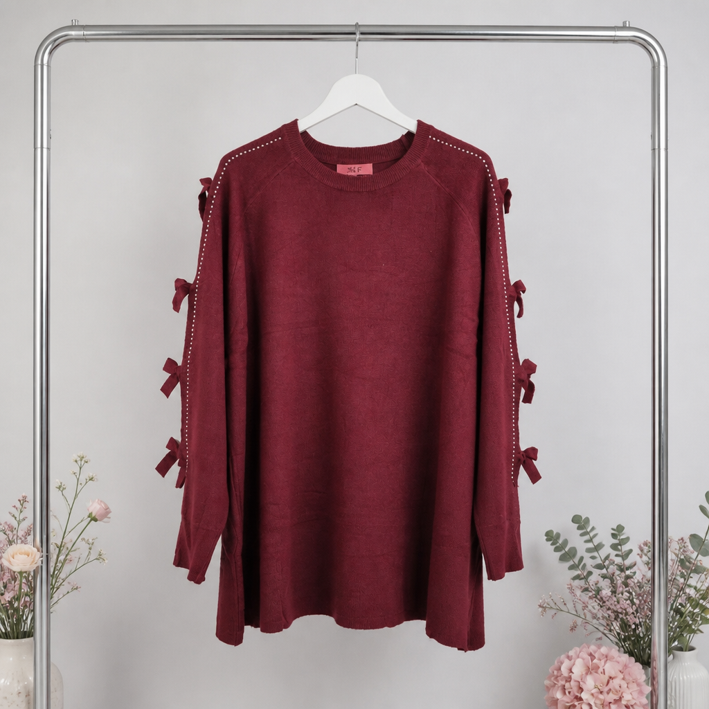 Strickpulli mit Cutouts und Schleifen