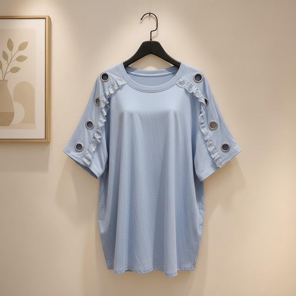 Shirt mit goldenen Ösen und coolen Rüschen